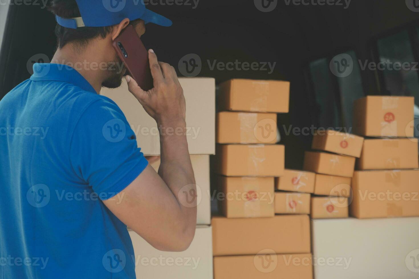 Business woman start up small business entrepreneur SME success .freelance woman working at home with Online Parcel delivery. SME and packaging deliveryconcept photo