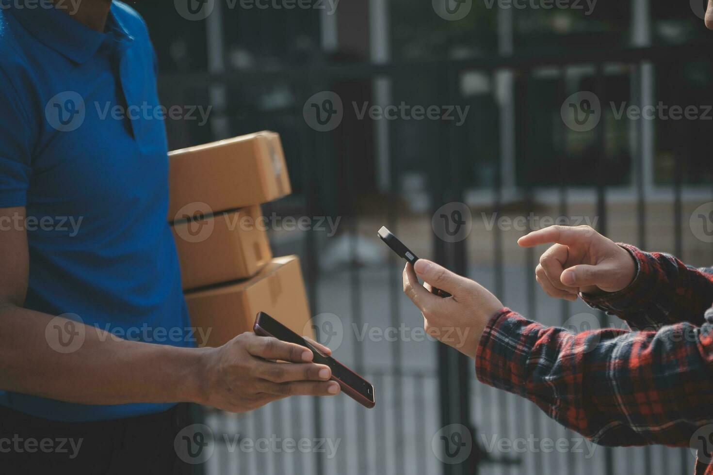 Startup small business entrepreneur of freelance Asian woman using a laptop with box Cheerful success Asian woman her hand lifts up online marketing packaging box and delivery SME idea concept photo