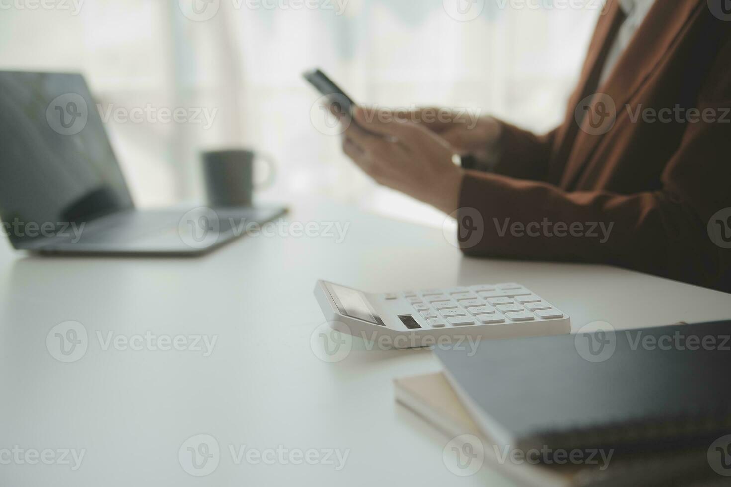 Audit concept,Administrator business man financial inspector and secretary making report calculating balance. Internal Revenue Service checking document. photo