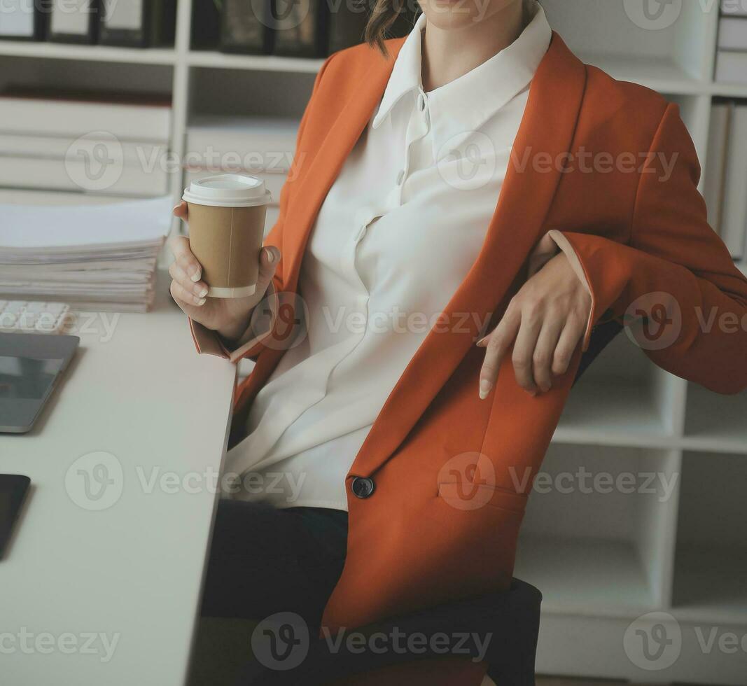 Audit concept,Administrator business man financial inspector and secretary making report calculating balance. Internal Revenue Service checking document. photo