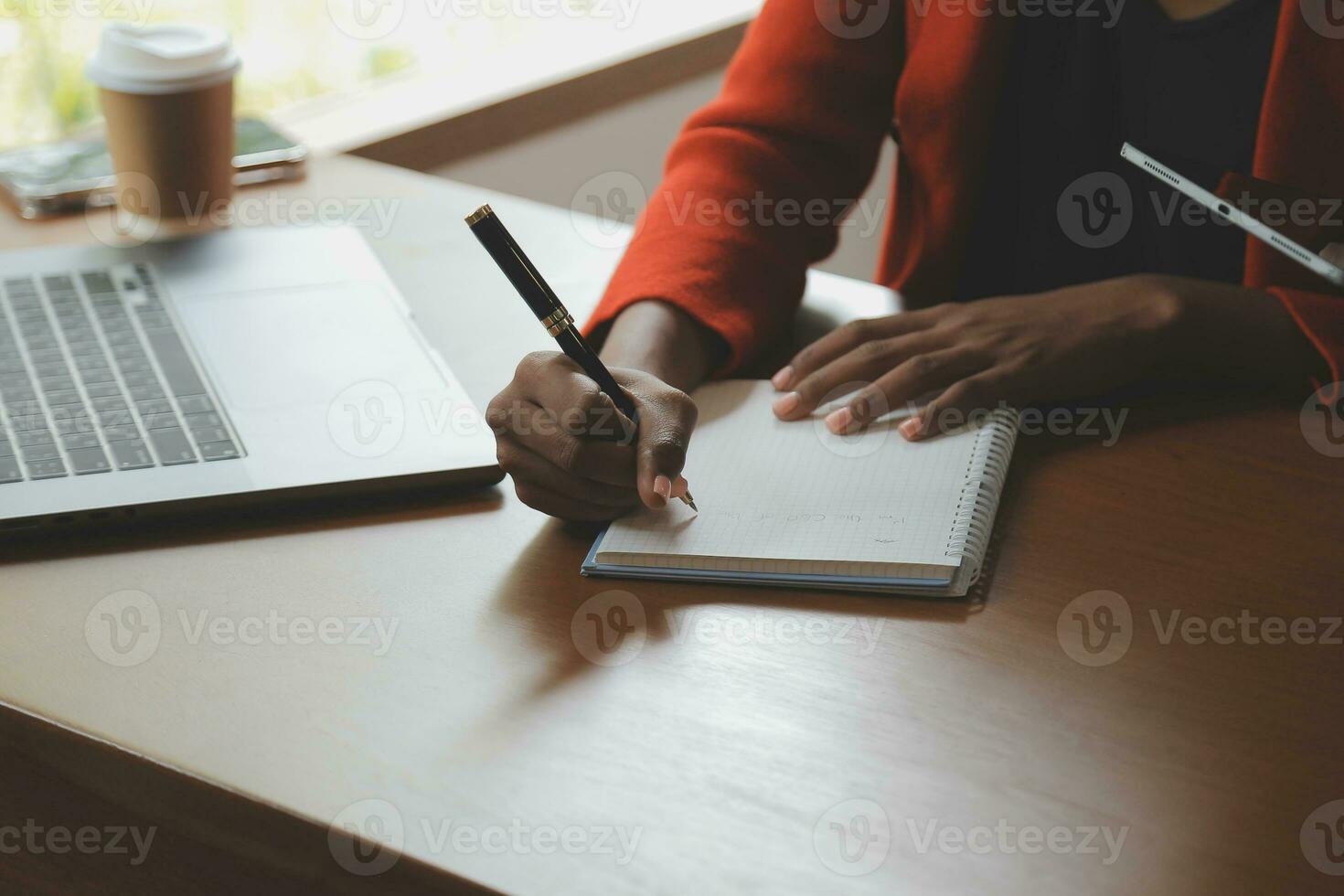 Close up of accountant working and analyzing financial reports project accounting with chart graph and calculator in modern office  finance and business concept. photo