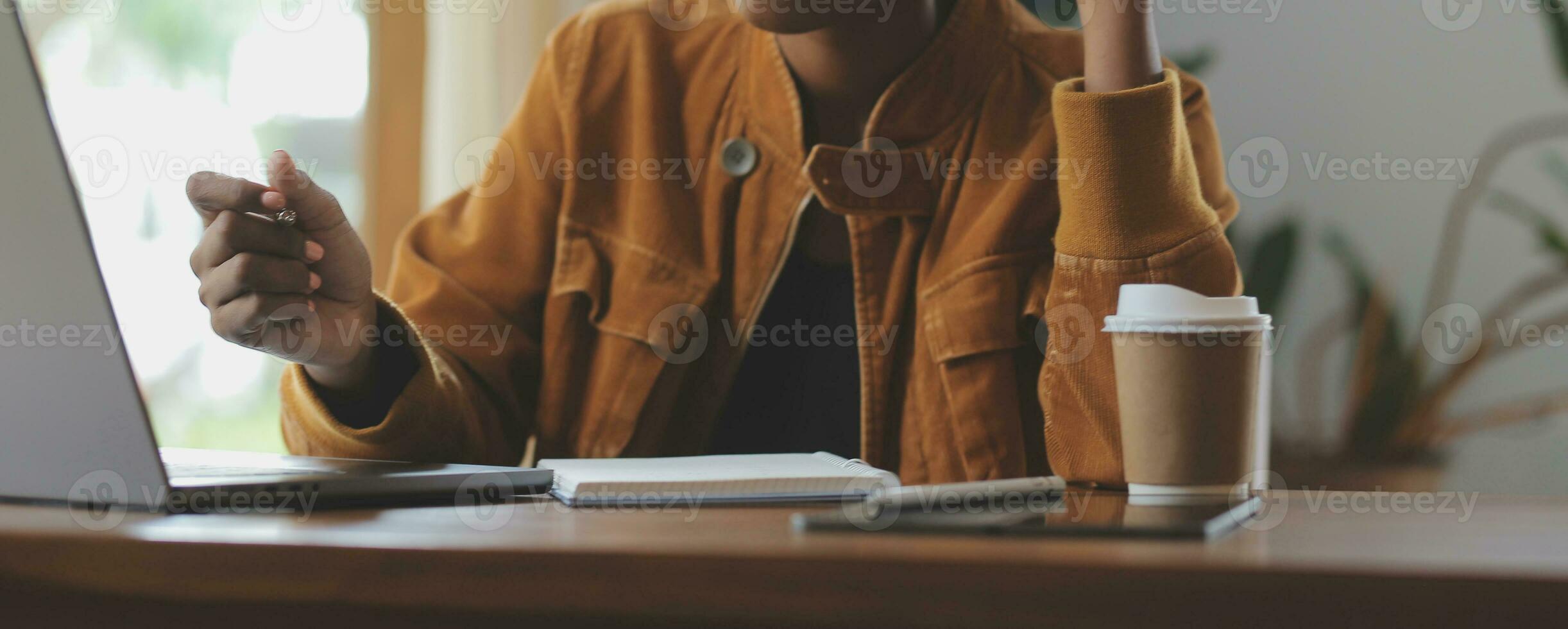 Close up of accountant working and analyzing financial reports project accounting with chart graph and calculator in modern office  finance and business concept. photo