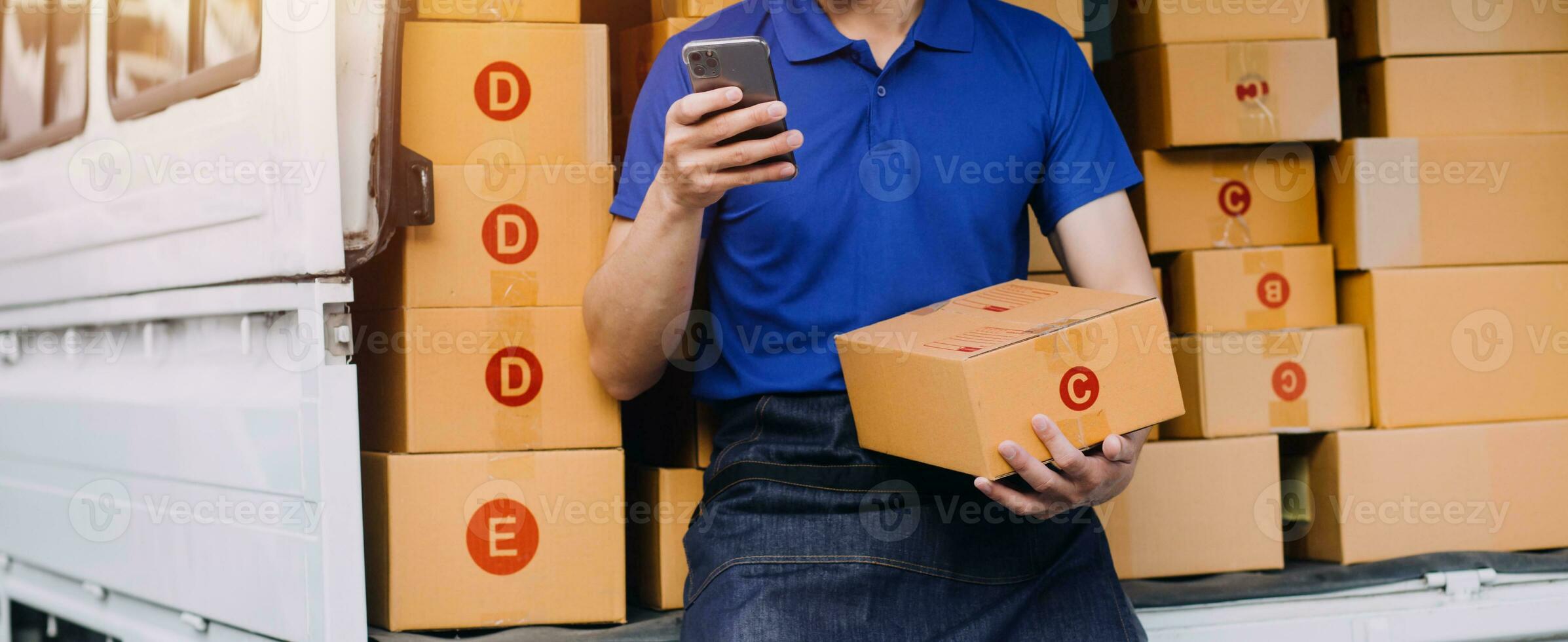 Business woman start up small business entrepreneur SME success .freelance woman working at home with Online Parcel delivery. SME and packaging deliveryconcept photo