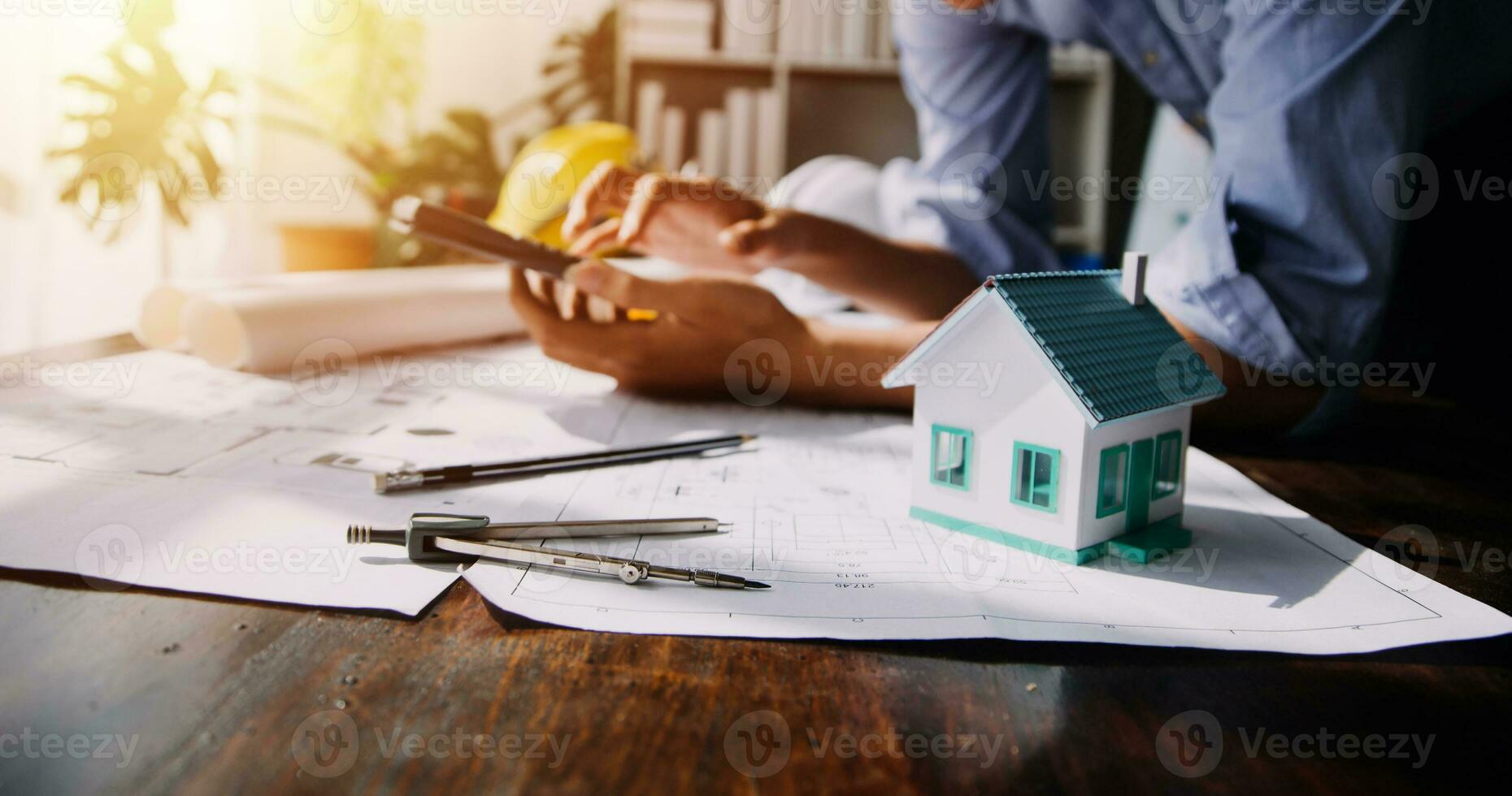 Diverse Team of Specialists Use Tablet Computer on Construction Site. Real Estate Building Project with Civil Engineer, Architect, Business Investor and General Worker Discussing Plan Details. photo