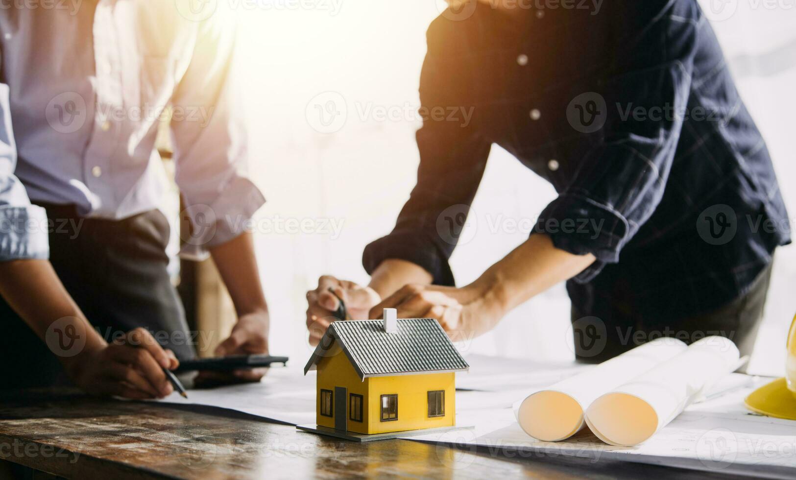Diverse Team of Specialists Use Tablet Computer on Construction Site. Real Estate Building Project with Civil Engineer, Architect, Business Investor and General Worker Discussing Plan Details. photo