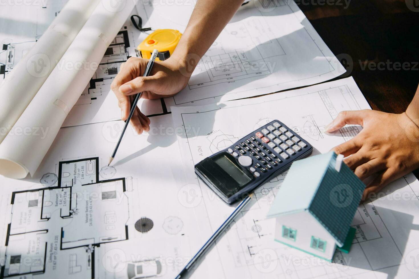 Diverse Team of Specialists Use Tablet Computer on Construction Site. Real Estate Building Project with Civil Engineer, Architect, Business Investor and General Worker Discussing Plan Details. photo