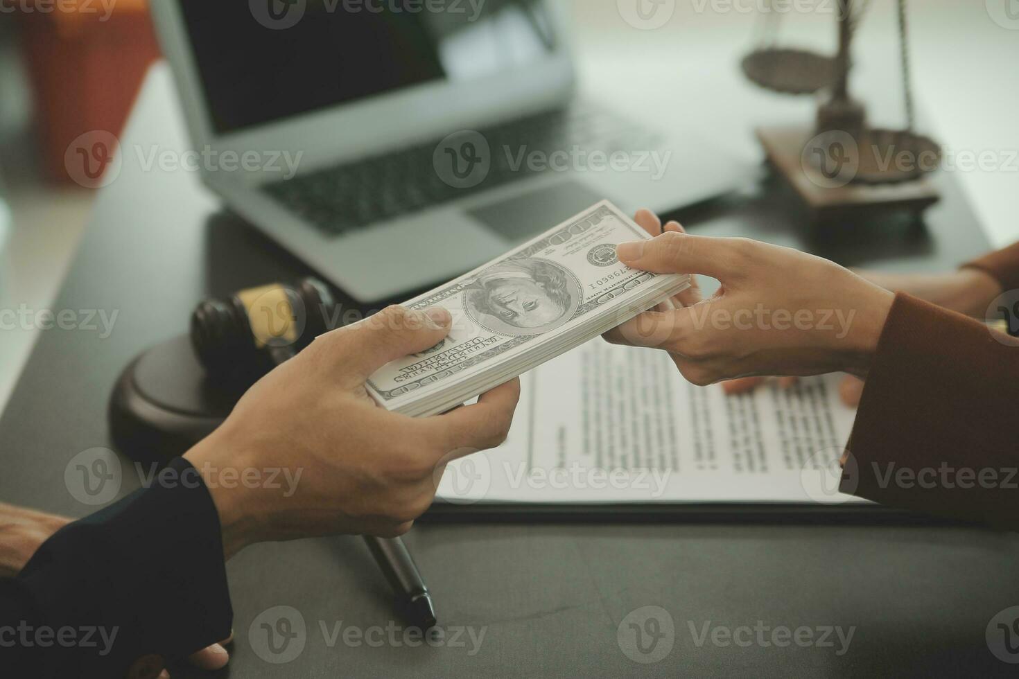 Business and lawyers discussing contract papers with brass scale on desk in office. Law, legal services, advice, justice and law concept picture with film grain effect photo