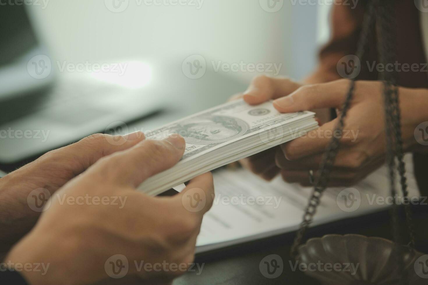 Business and lawyers discussing contract papers with brass scale on desk in office. Law, legal services, advice, justice and law concept picture with film grain effect photo