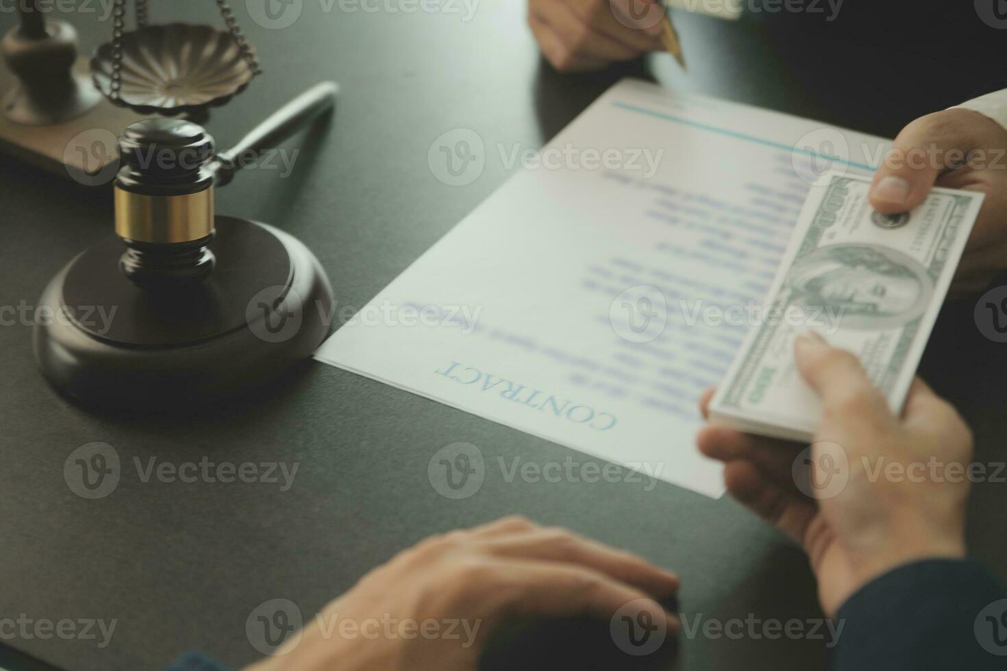Business and lawyers discussing contract papers with brass scale on desk in office. Law, legal services, advice, justice and law concept picture with film grain effect photo