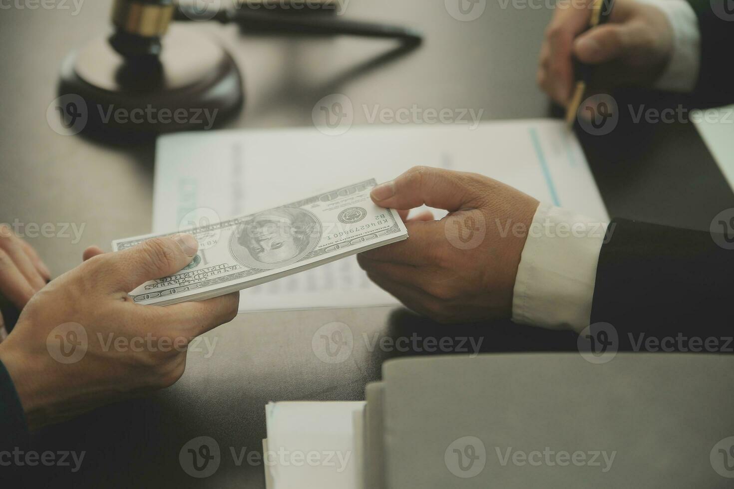 Business and lawyers discussing contract papers with brass scale on desk in office. Law, legal services, advice, justice and law concept picture with film grain effect photo