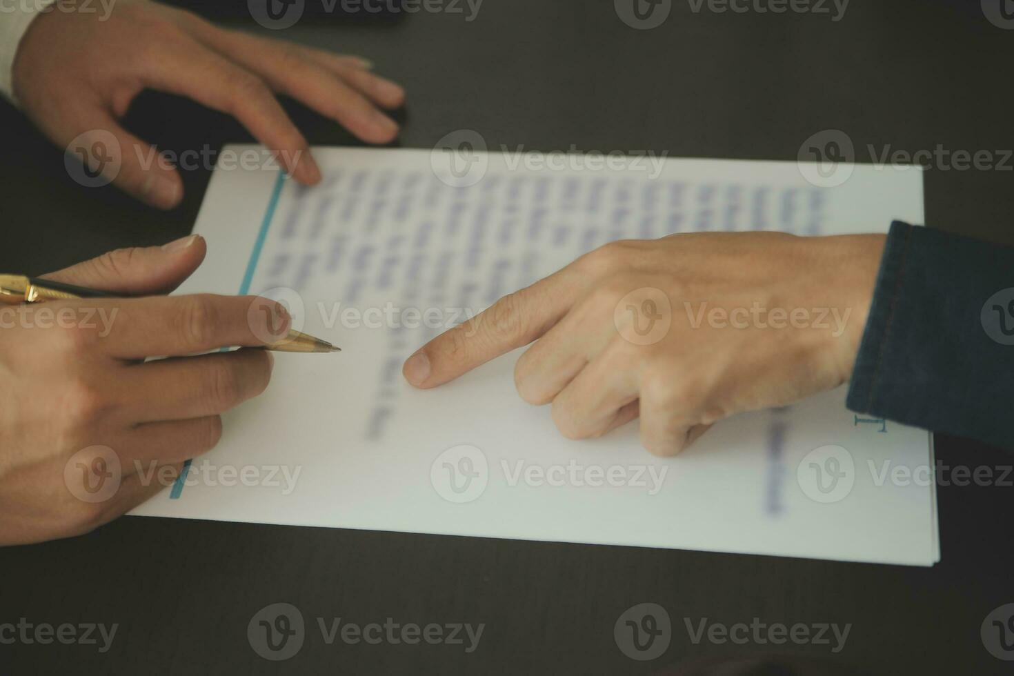 Business and lawyers discussing contract papers with brass scale on desk in office. Law, legal services, advice, justice and law concept picture with film grain effect photo