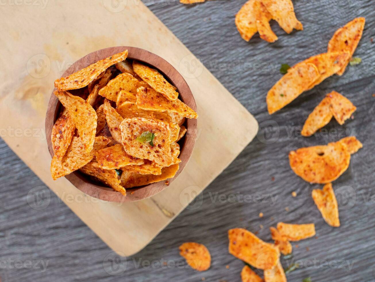 top view of basreng or spicy chips made from fried baso. A typical Sundanese, Indonesian spicy crispy snack. photo