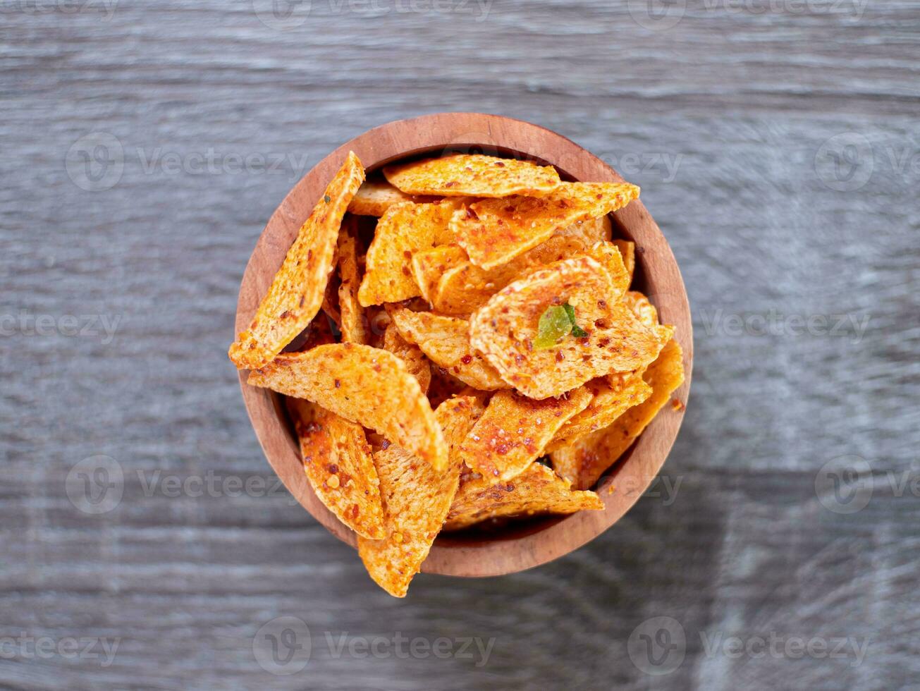 top view of basreng or spicy chips made from fried baso. A typical Sundanese, Indonesian spicy crispy snack. photo