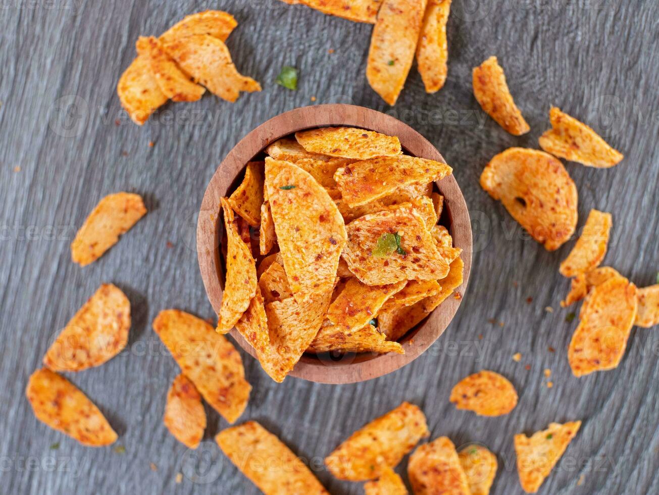 top view of basreng or spicy chips made from fried baso. A typical Sundanese, Indonesian spicy crispy snack. photo