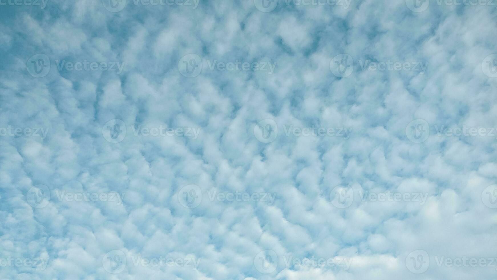 beautiful white clouds on the blue sky for background photo