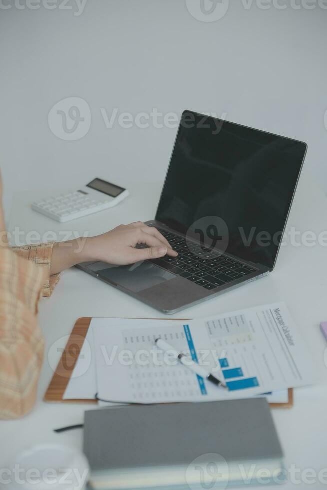 Business Documents, Auditor businesswoman checking searching document legal prepare paperwork or report for analysis TAX time,accountant Documents data contract partner deal in workplace office photo