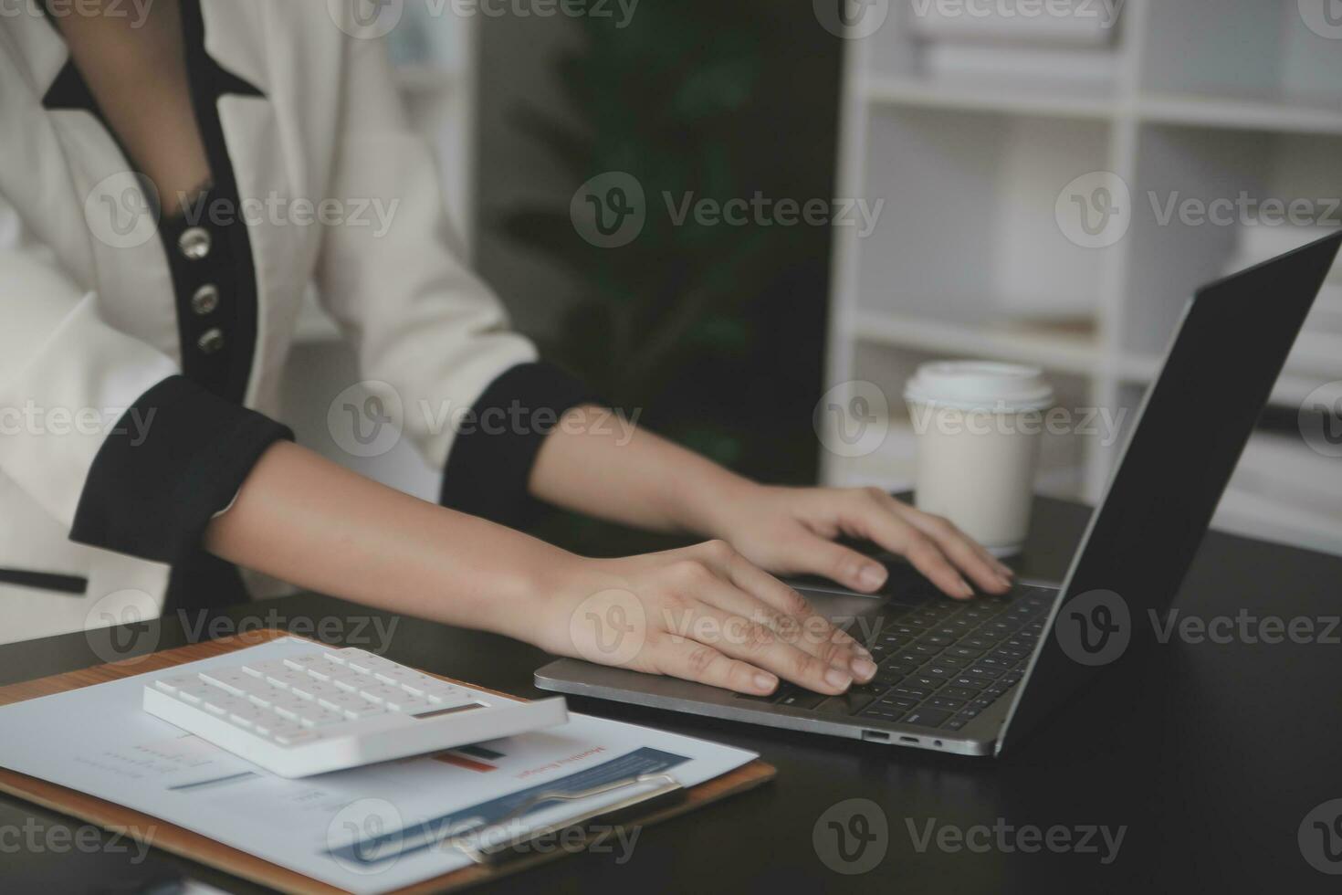 Business Documents, Auditor businesswoman checking searching document legal prepare paperwork or report for analysis TAX time,accountant Documents data contract partner deal in workplace office photo