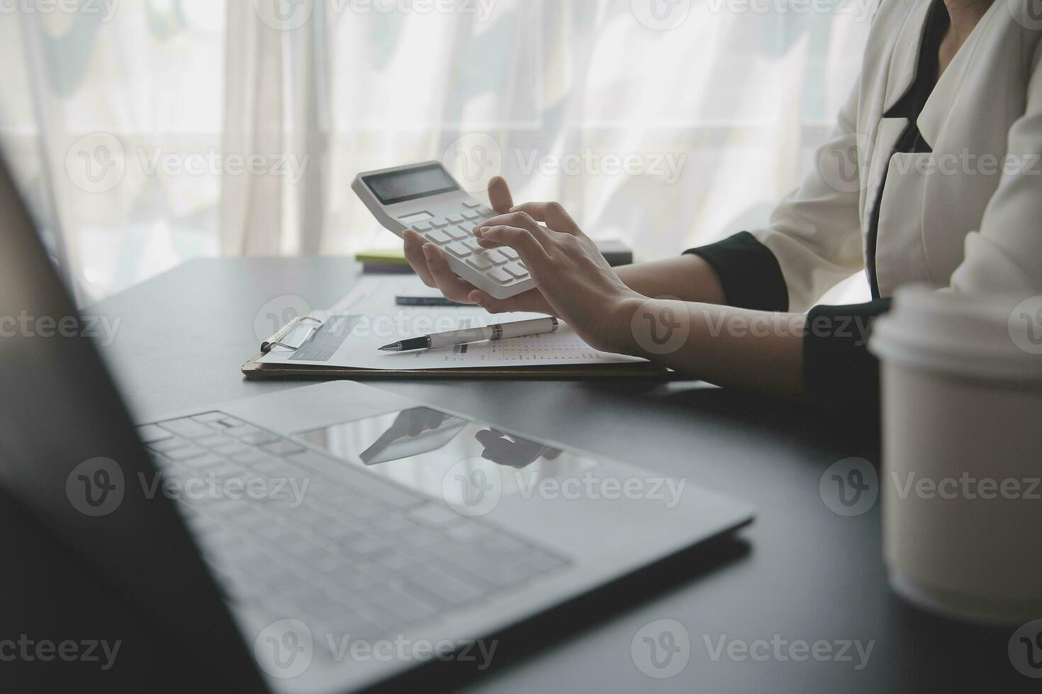 Business Documents, Auditor businesswoman checking searching document legal prepare paperwork or report for analysis TAX time,accountant Documents data contract partner deal in workplace office photo