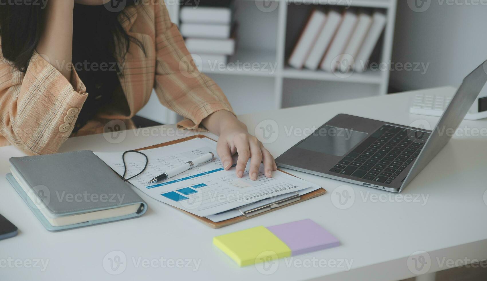 Business Documents, Auditor businesswoman checking searching document legal prepare paperwork or report for analysis TAX time,accountant Documents data contract partner deal in workplace office photo