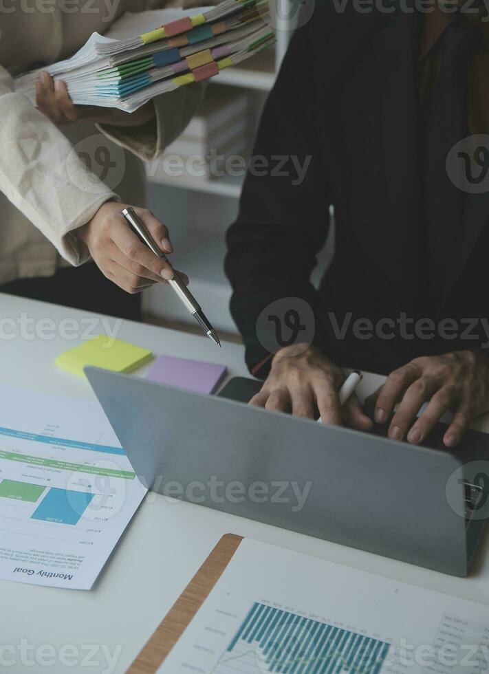 Business Documents, Auditor businesswoman checking searching document legal prepare paperwork or report for analysis TAX time,accountant Documents data contract partner deal in workplace office photo