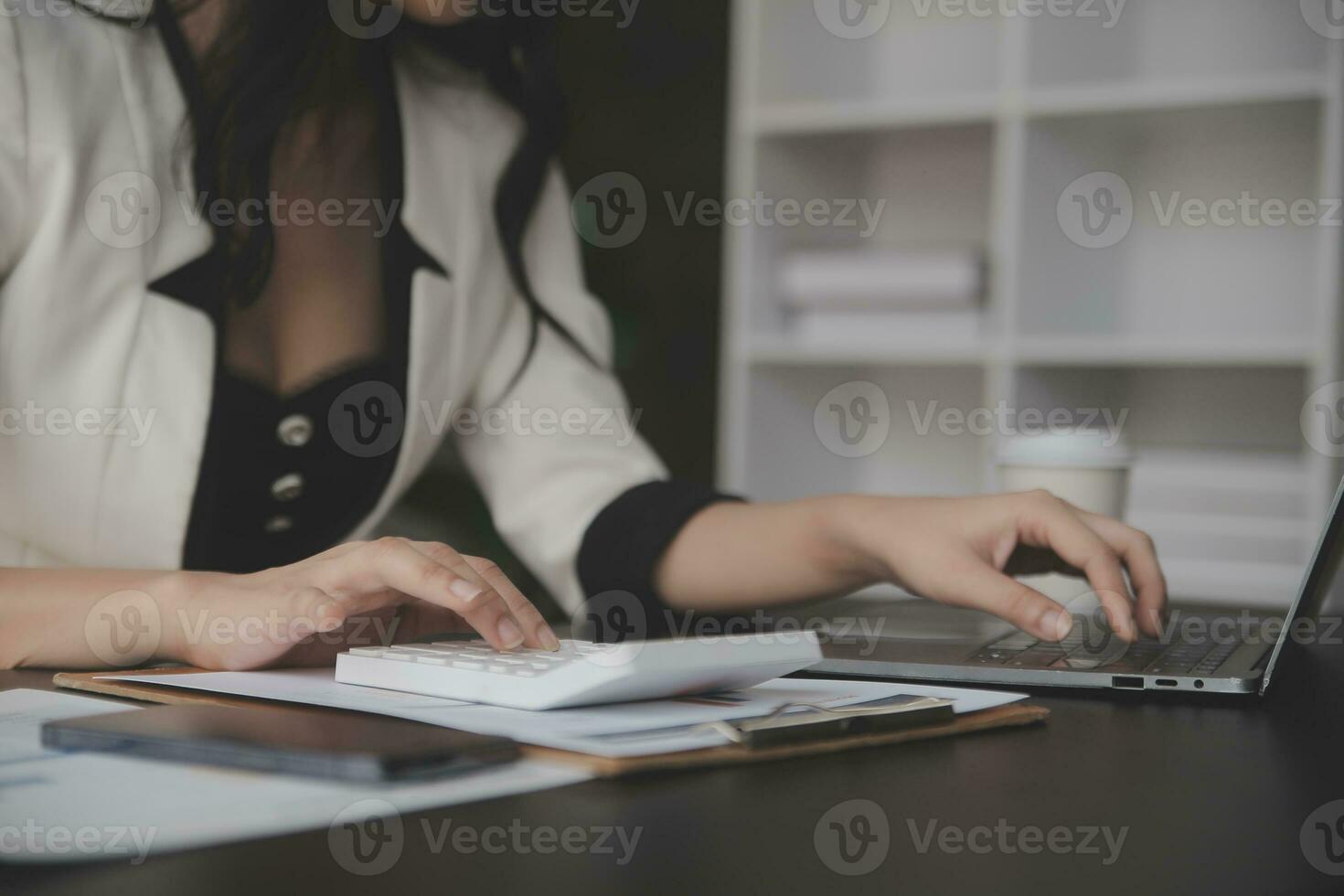 Business Documents, Auditor businesswoman checking searching document legal prepare paperwork or report for analysis TAX time,accountant Documents data contract partner deal in workplace office photo