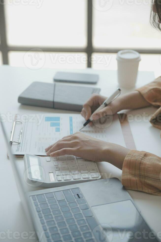 Business Documents, Auditor businesswoman checking searching document legal prepare paperwork or report for analysis TAX time,accountant Documents data contract partner deal in workplace office photo