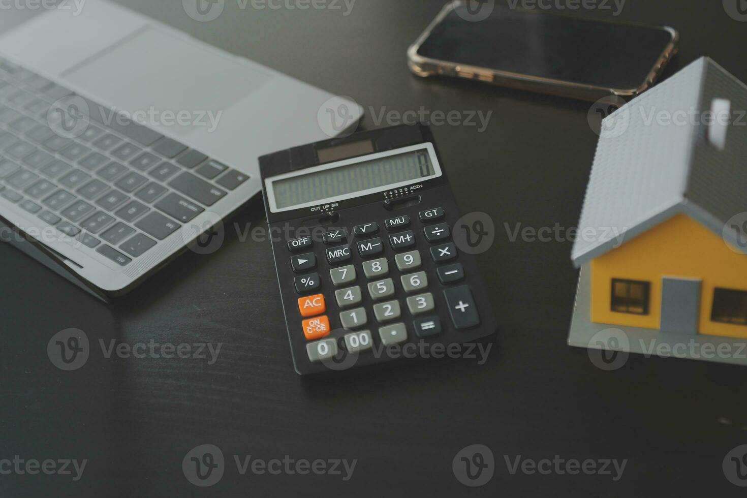 Female woman hands holding home model, small miniature white toy house. Mortgage property insurance dream moving home and real estate concept photo