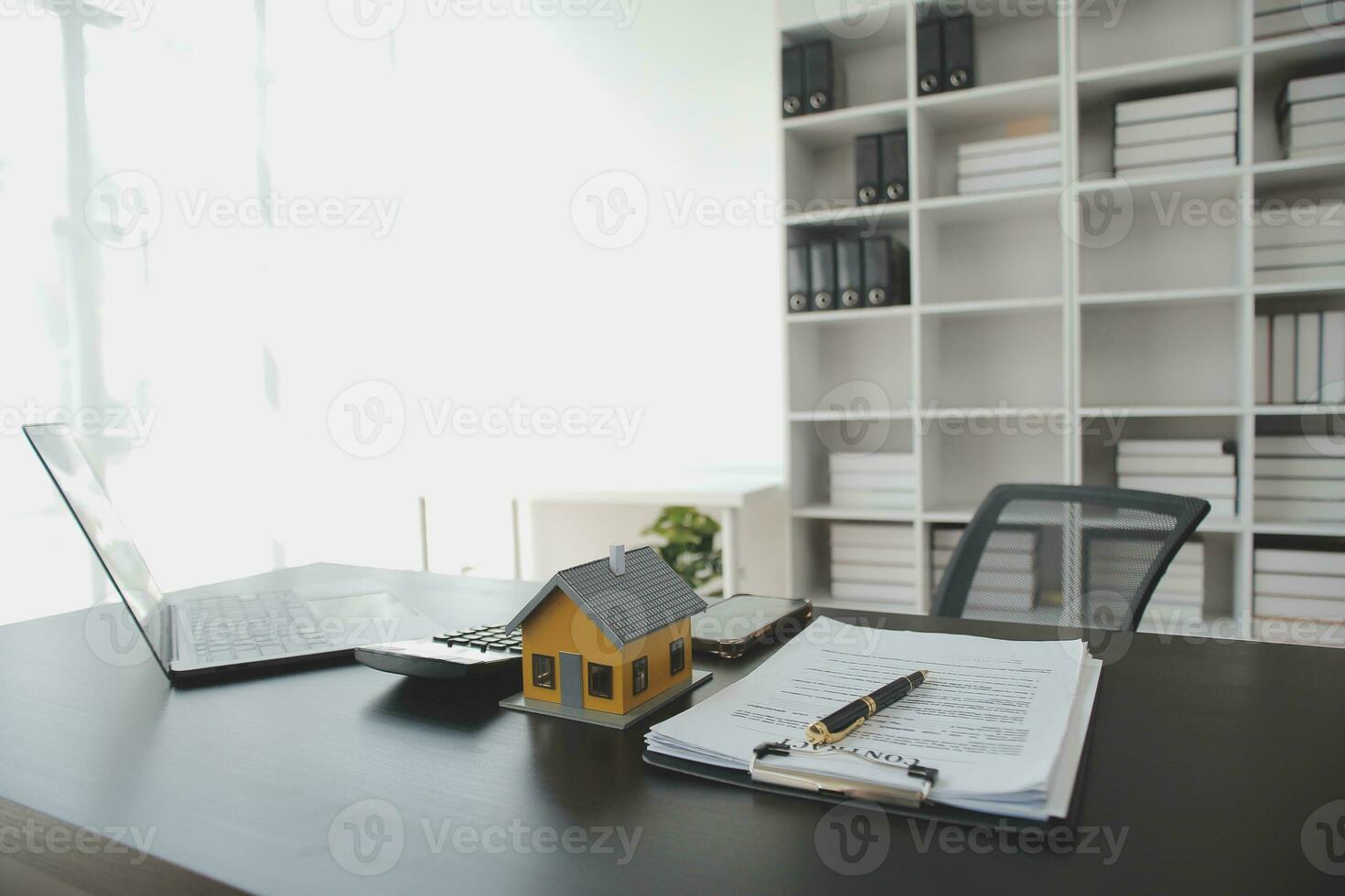 Female woman hands holding home model, small miniature white toy house. Mortgage property insurance dream moving home and real estate concept photo