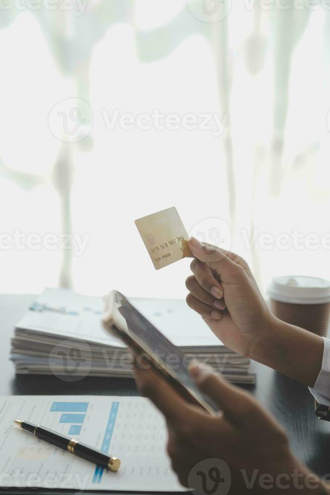 Concept online payment with cradit card. Hand of men using laptop for to payment make online health insurance. photo