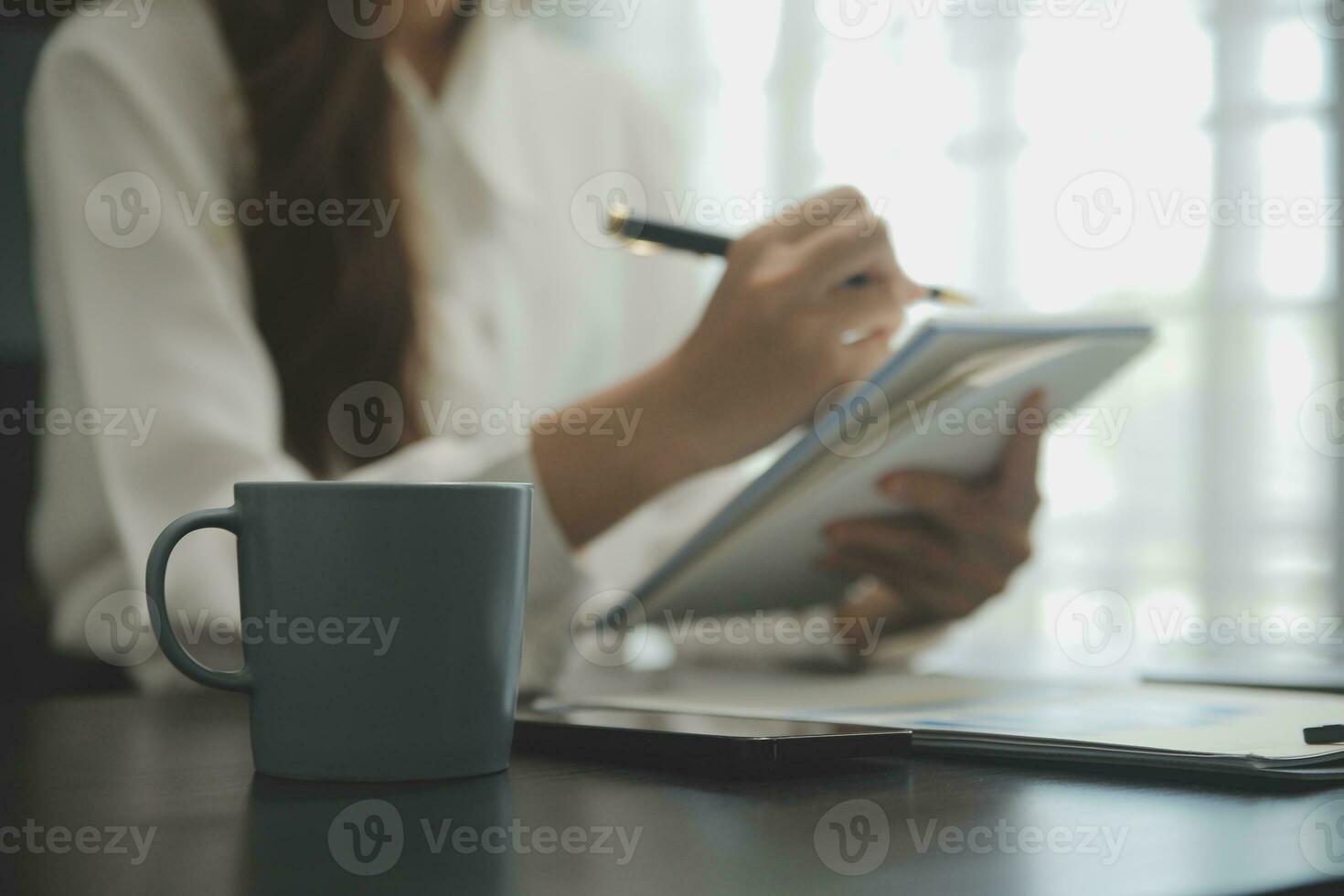Audit concept,Administrator business man financial inspector and secretary making report calculating balance. Internal Revenue Service checking document. photo