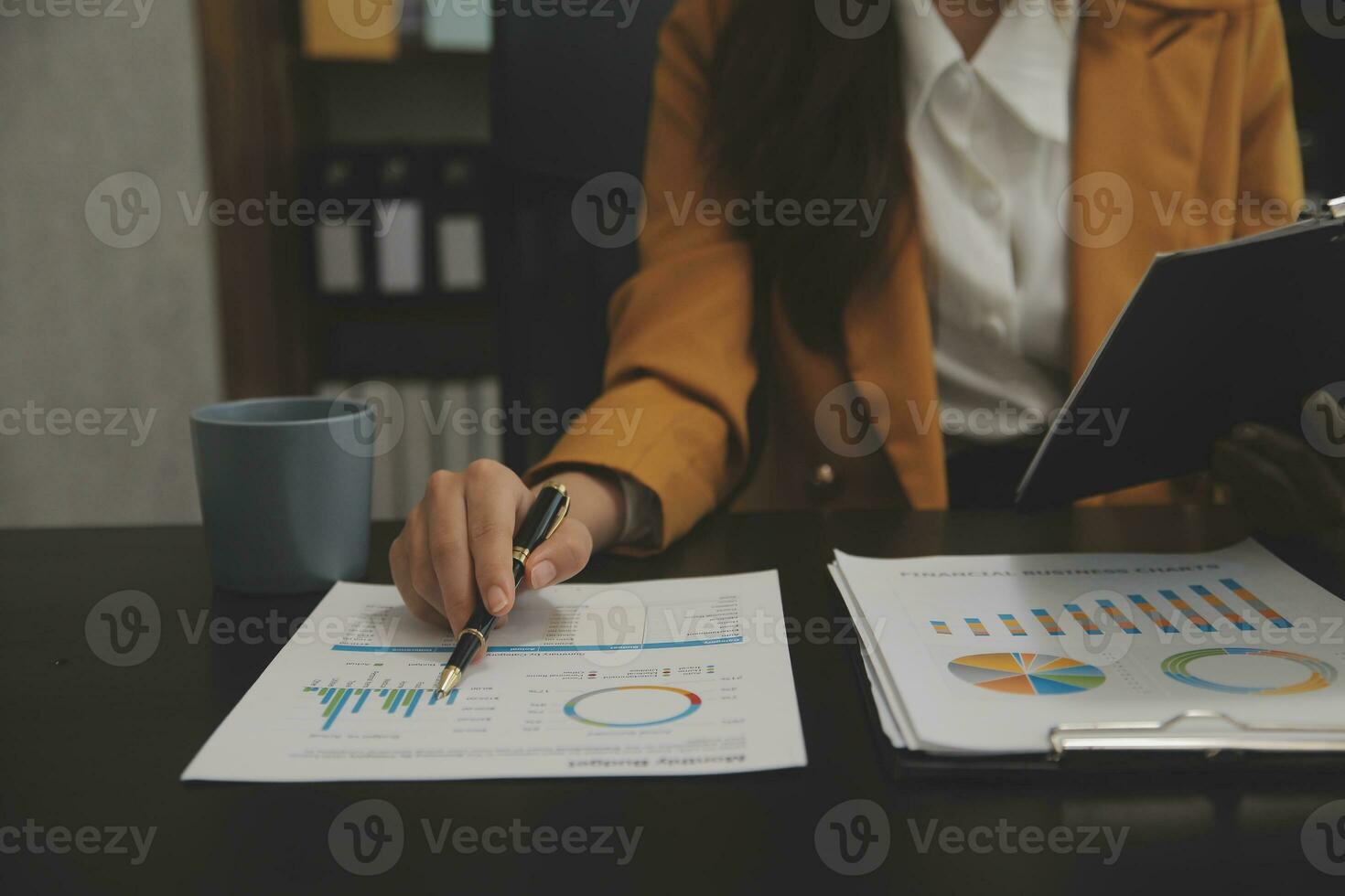 Audit concept,Administrator business man financial inspector and secretary making report calculating balance. Internal Revenue Service checking document. photo