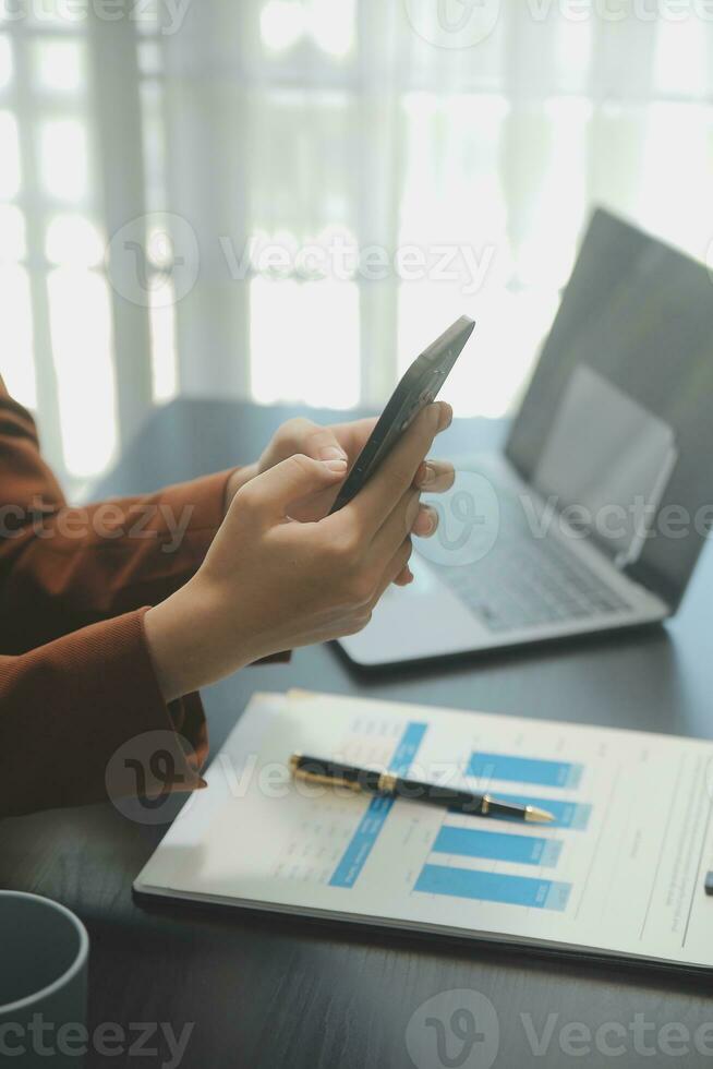 Audit concept,Administrator business man financial inspector and secretary making report calculating balance. Internal Revenue Service checking document. photo