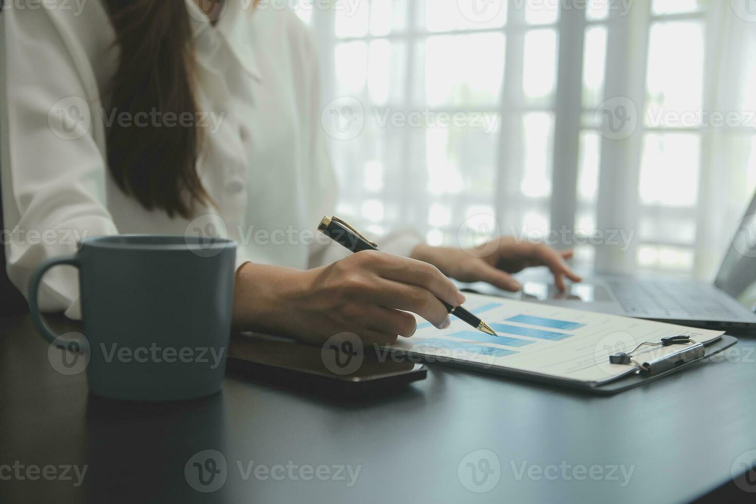 Audit concept,Administrator business man financial inspector and secretary making report calculating balance. Internal Revenue Service checking document. photo