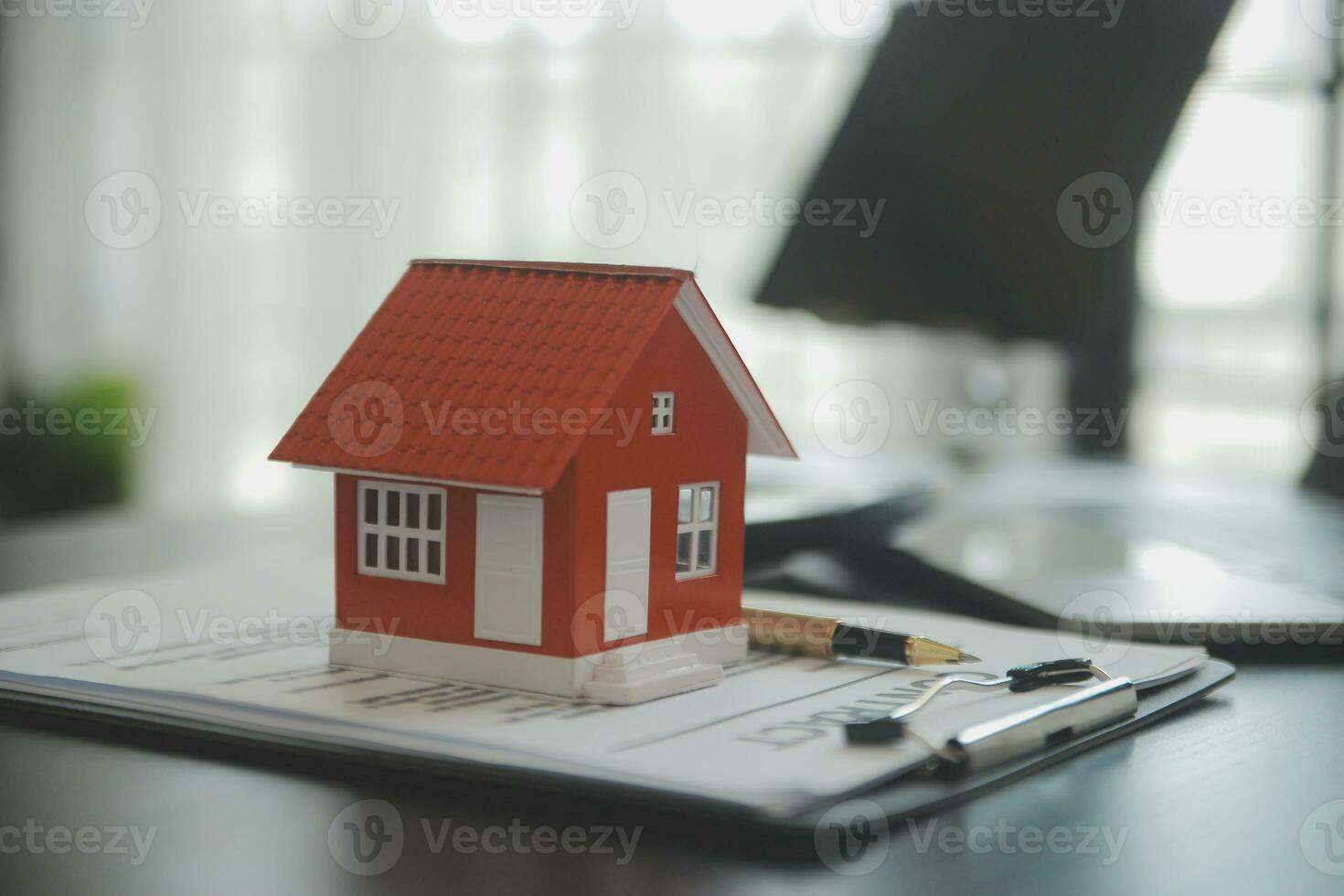 Female woman hands holding home model, small miniature white toy house. Mortgage property insurance dream moving home and real estate concept photo