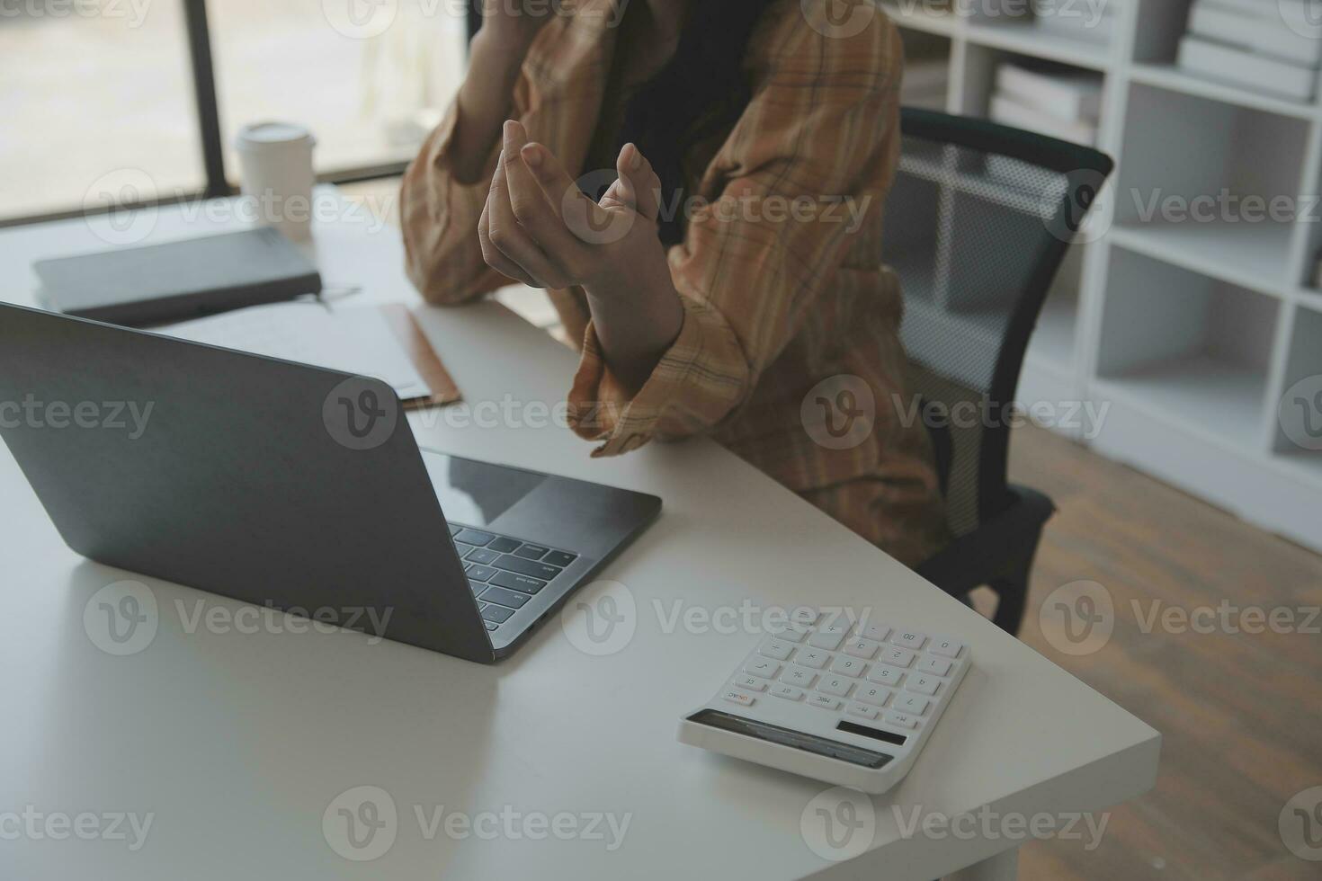 Audit concept,Administrator business man financial inspector and secretary making report calculating balance. Internal Revenue Service checking document. photo