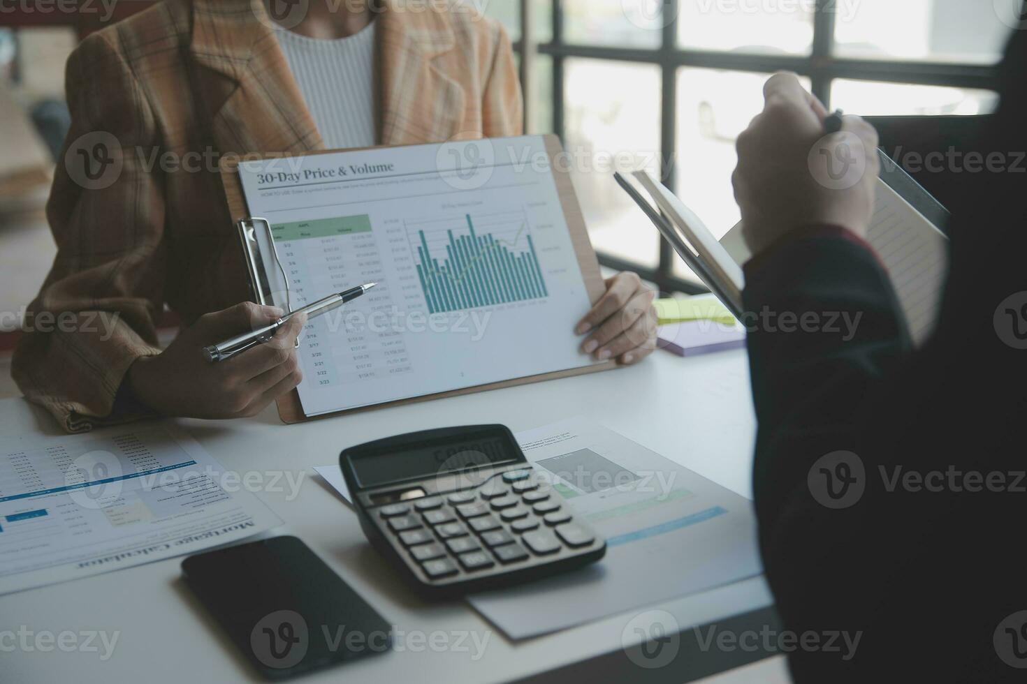 Audit concept,Administrator business man financial inspector and secretary making report calculating balance. Internal Revenue Service checking document. photo