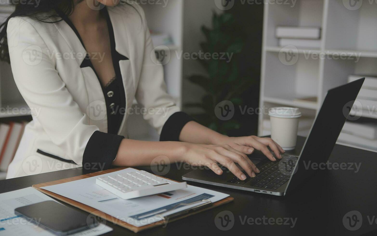 Audit concept,Administrator business man financial inspector and secretary making report calculating balance. Internal Revenue Service checking document. photo