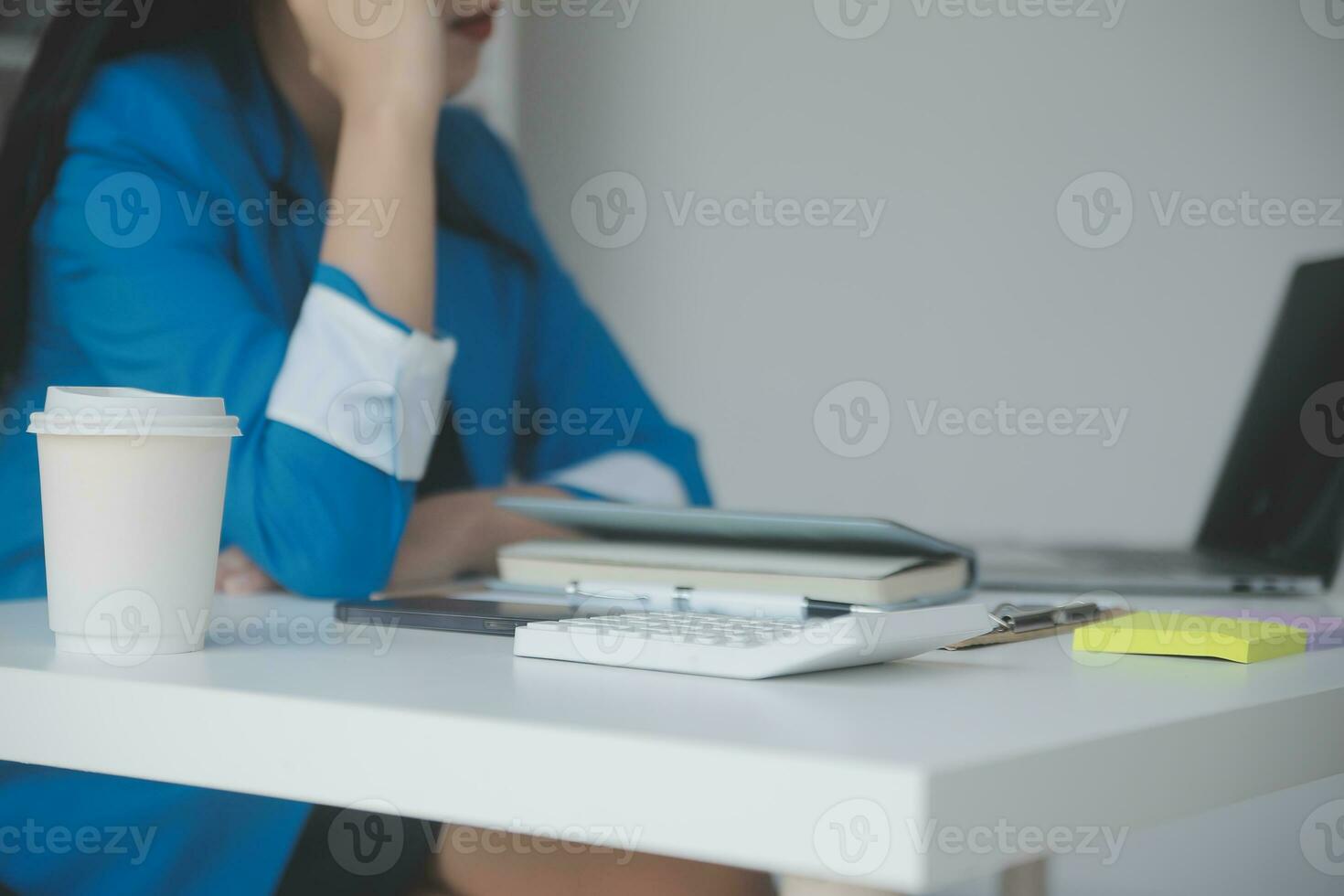 Audit concept,Administrator business man financial inspector and secretary making report calculating balance. Internal Revenue Service checking document. photo