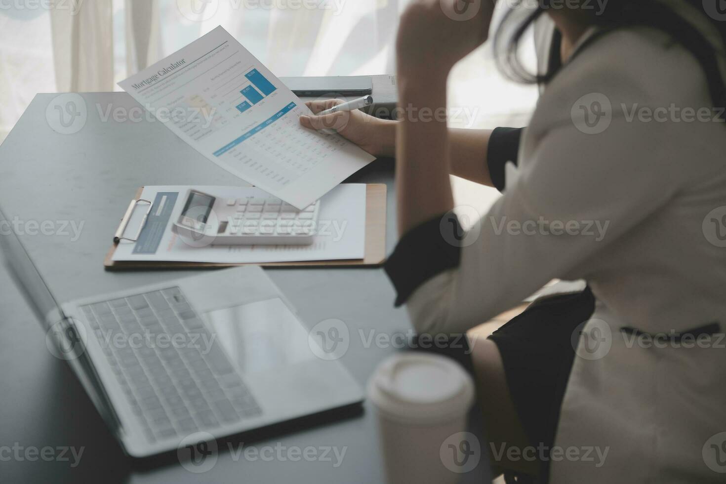 Audit concept,Administrator business man financial inspector and secretary making report calculating balance. Internal Revenue Service checking document. photo