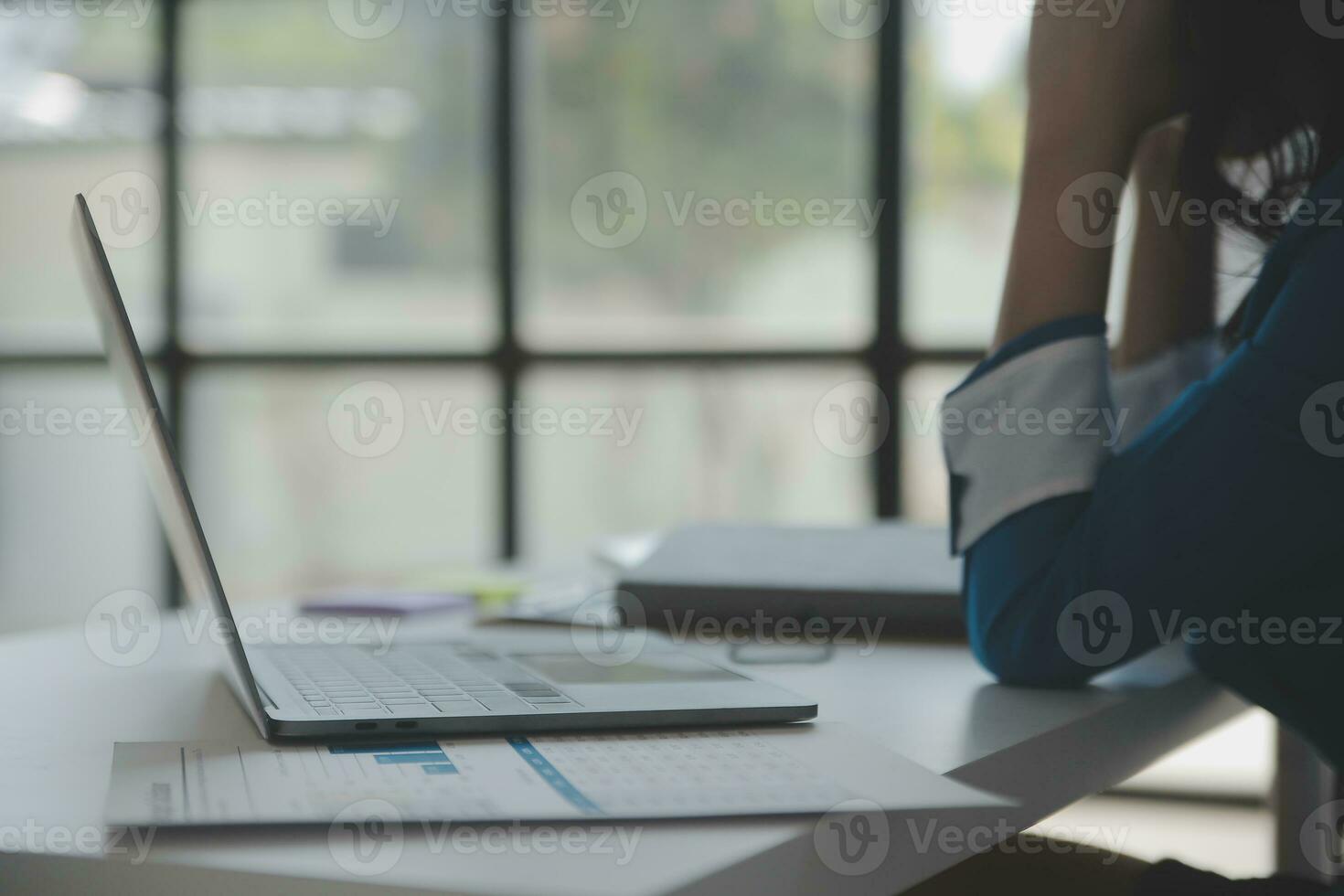 Audit concept,Administrator business man financial inspector and secretary making report calculating balance. Internal Revenue Service checking document. photo