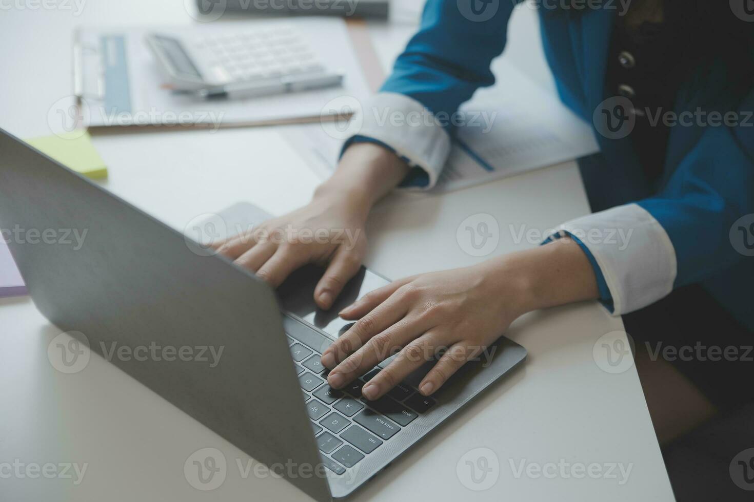 Audit concept,Administrator business man financial inspector and secretary making report calculating balance. Internal Revenue Service checking document. photo
