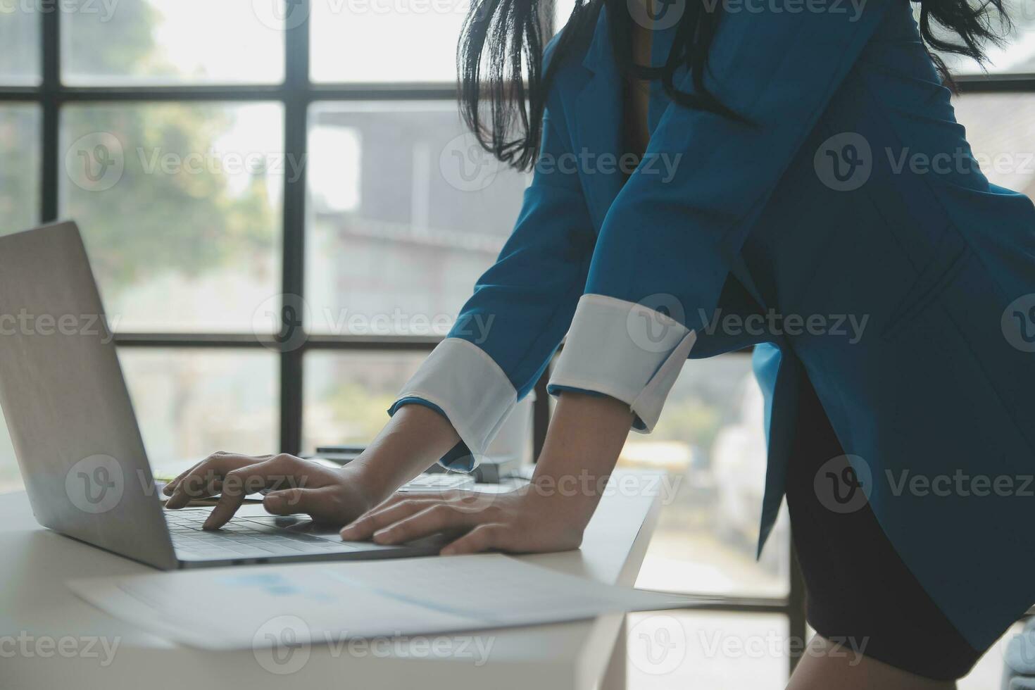 Audit concept,Administrator business man financial inspector and secretary making report calculating balance. Internal Revenue Service checking document. photo