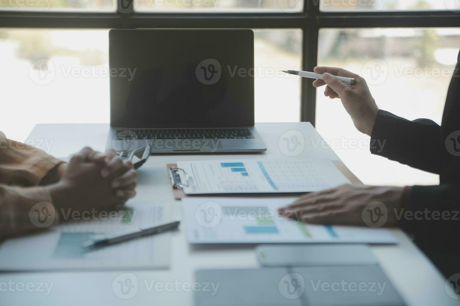 Audit concept,Administrator business man financial inspector and secretary making report calculating balance. Internal Revenue Service checking document. photo