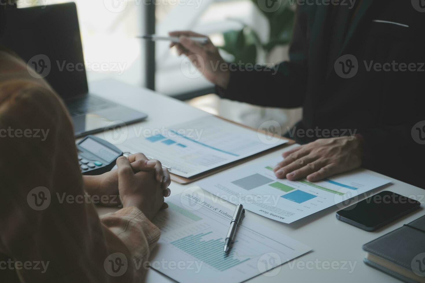Audit concept,Administrator business man financial inspector and secretary making report calculating balance. Internal Revenue Service checking document. photo