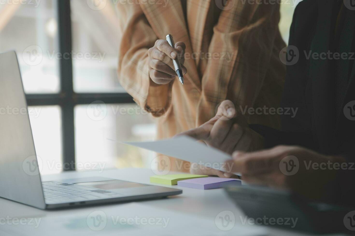 Audit concept,Administrator business man financial inspector and secretary making report calculating balance. Internal Revenue Service checking document. photo