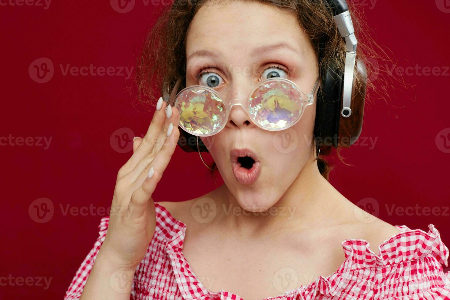girl wearing headphones glasses in the form of a diamond close-up unaltered photo