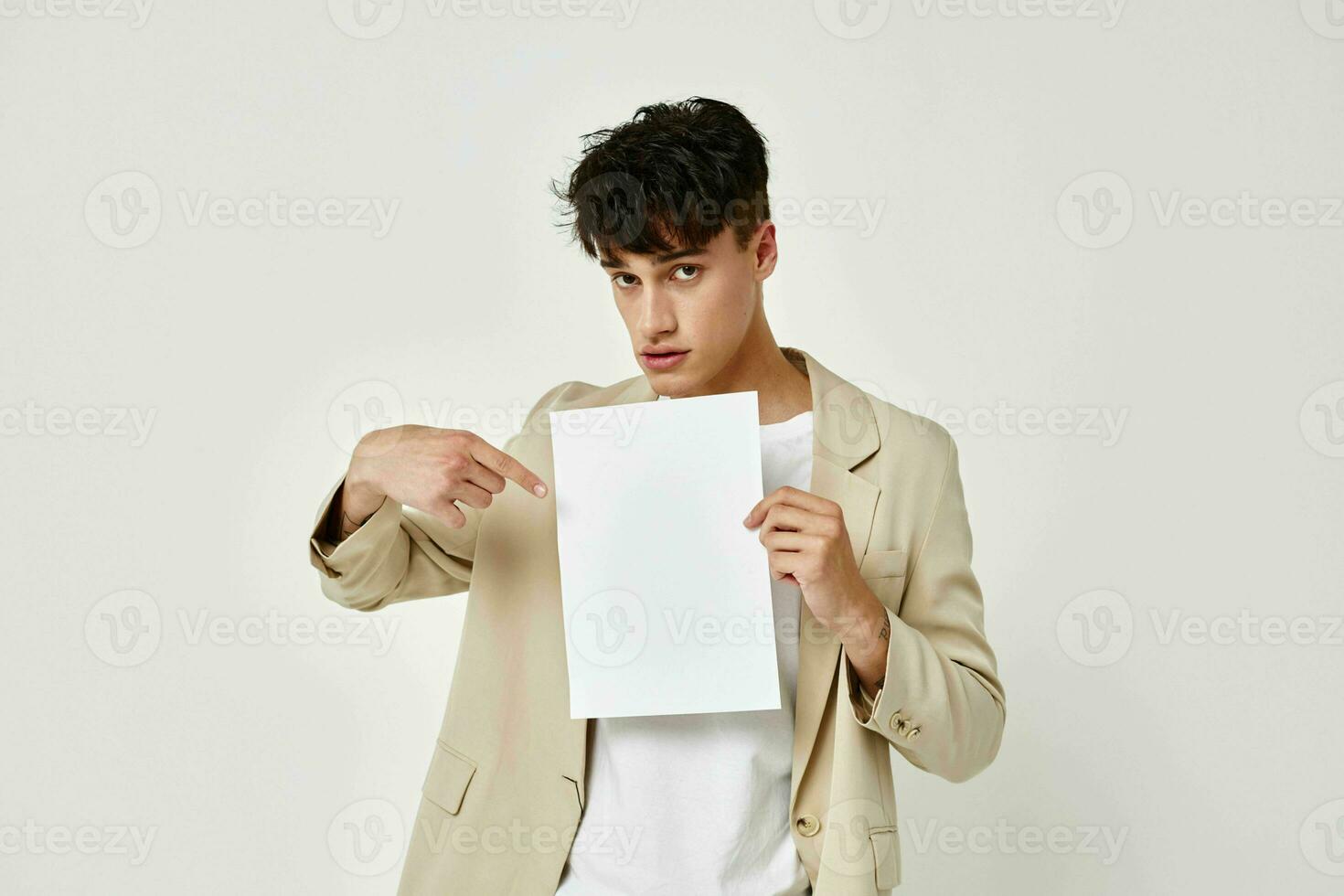 Photo young boyfriend posing jacket emotions light background unaltered