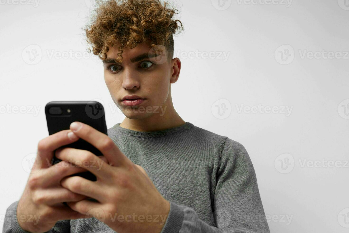 stylish guy talking on the phone posing emotions isolated background photo