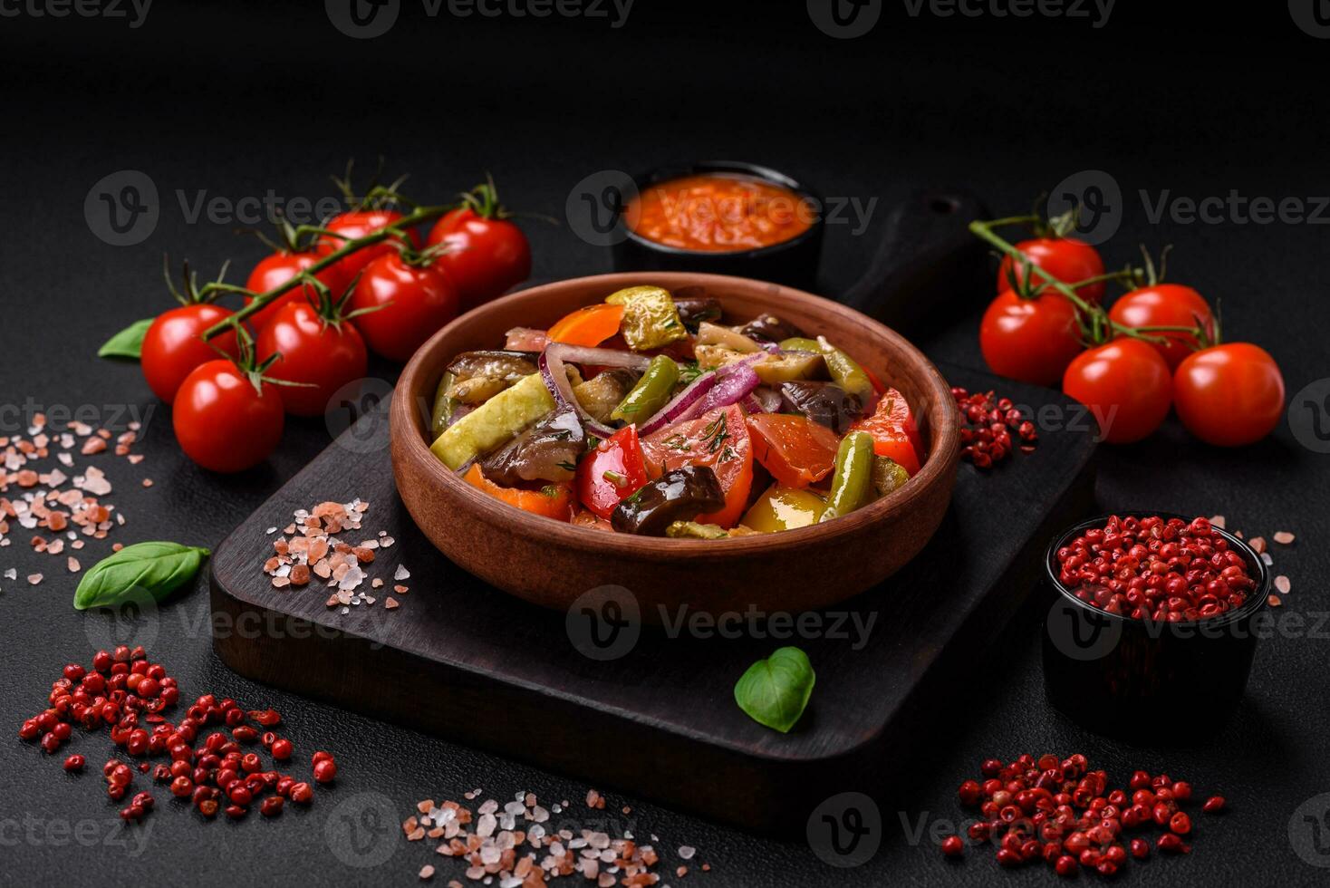 Delicious fresh vegetarian salad with tomatoes, green beans, eggplant and pepper photo