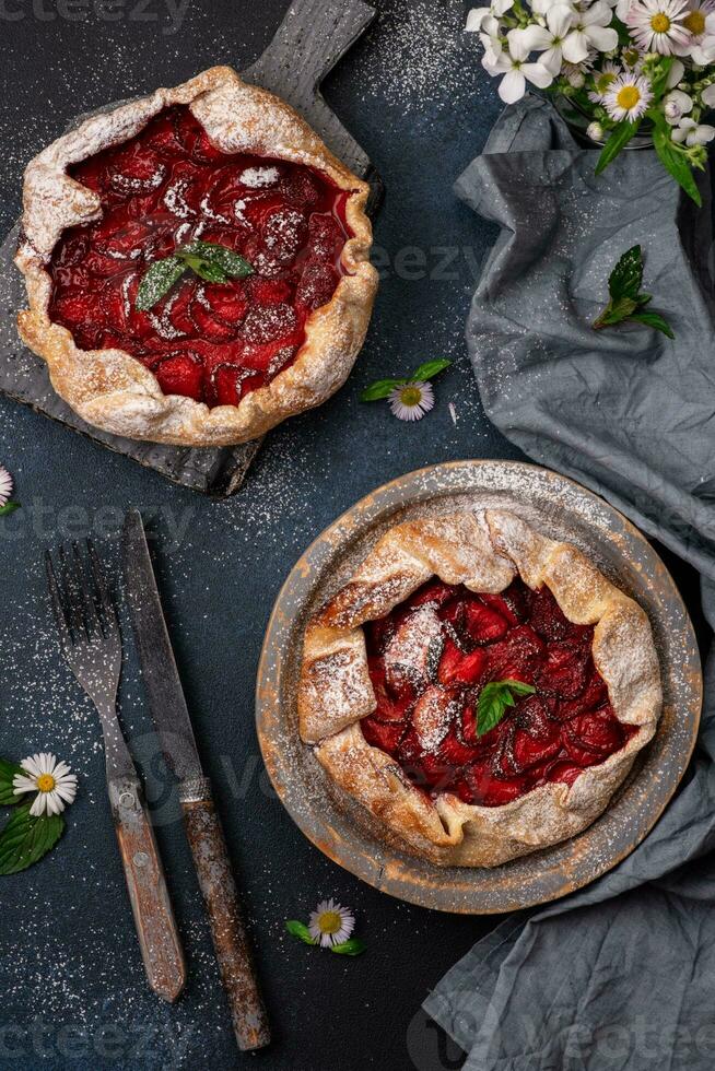 Delicious fresh sweet homemade rustic style strawberry tart photo